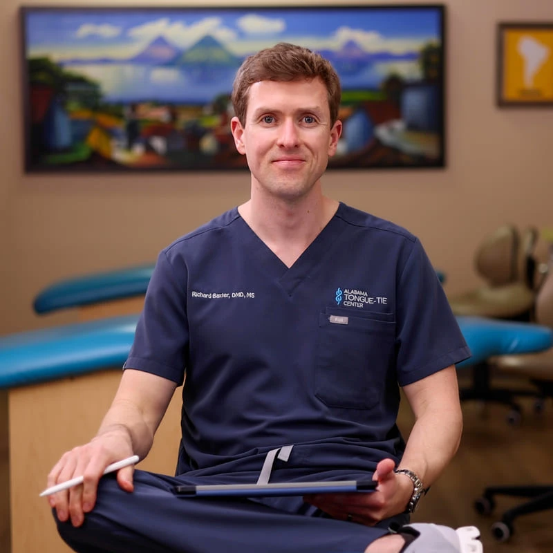 tongue-tie-education-support-tongue-tie-academy-banner-image Close up shot of Dr. Baxter at his clinic